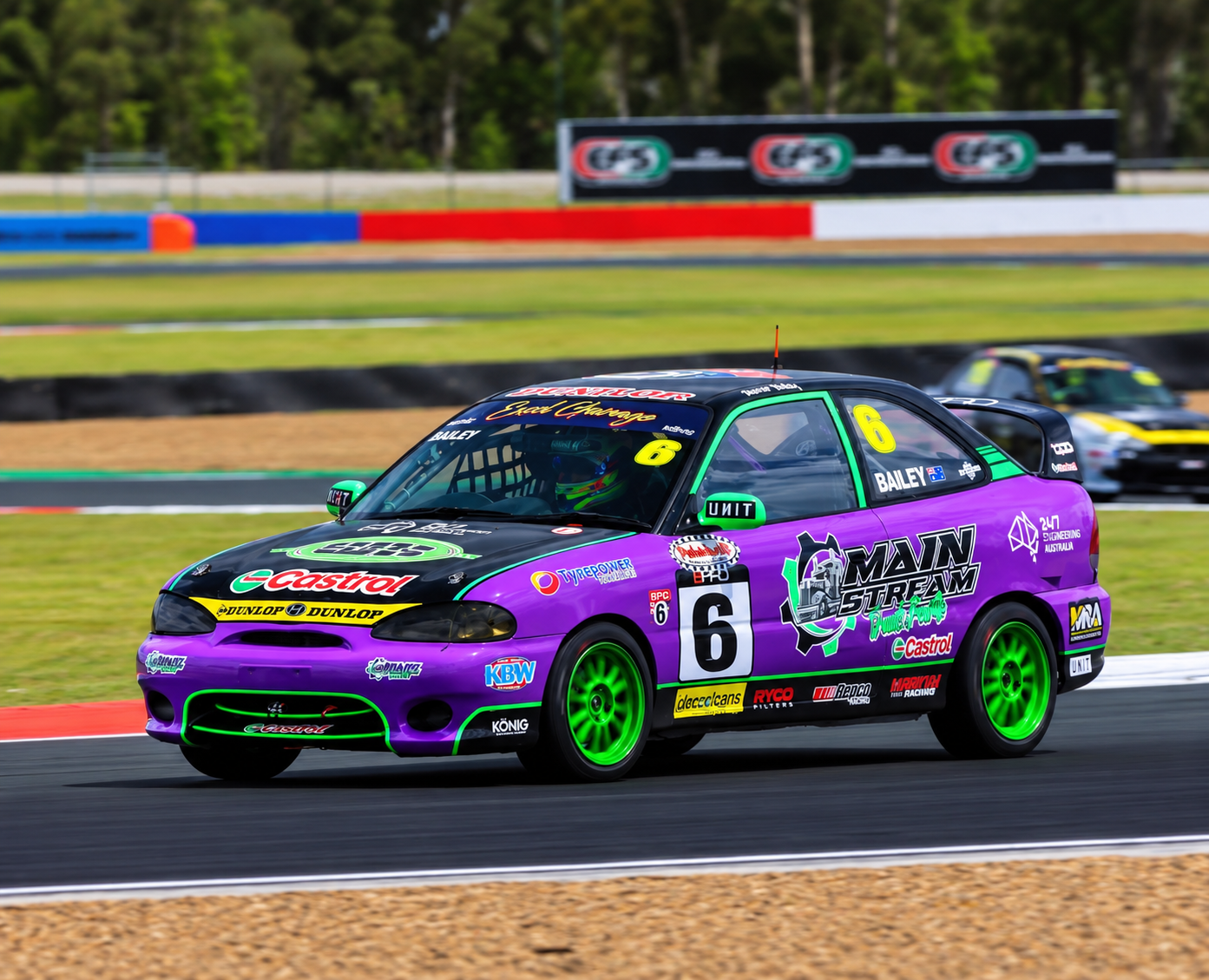 Buster Bailey Hyundai Excel race car displaying partner branding